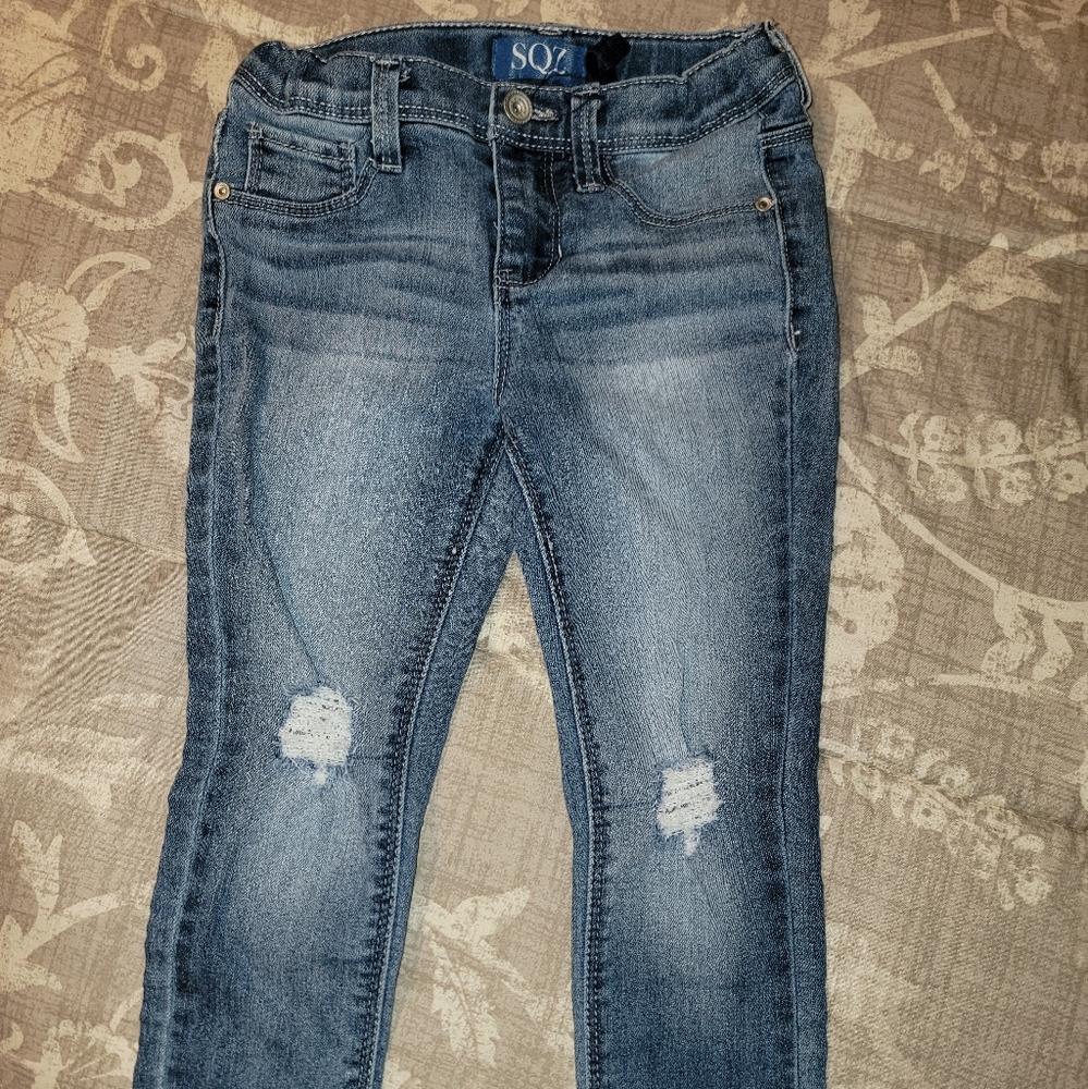 Girl's blue jeans